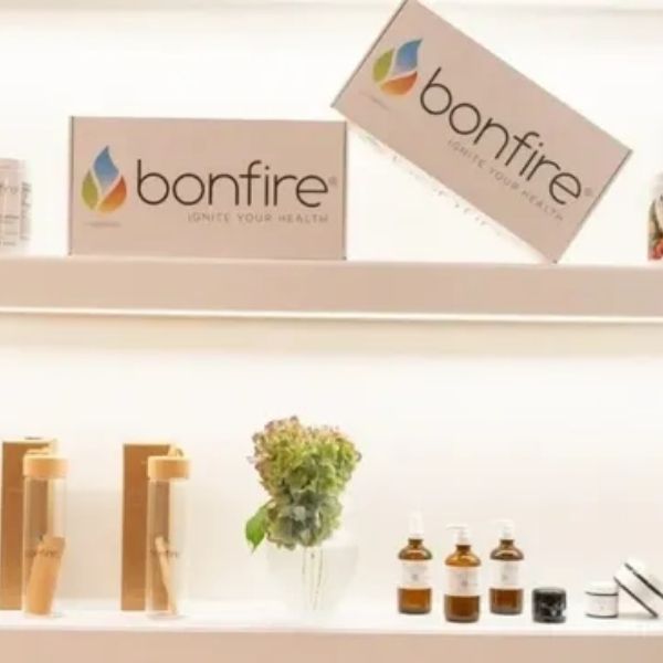 Display shelf featuring premium Bonfire Wellness nutraceuticals, health supplements, and botanical skincare products